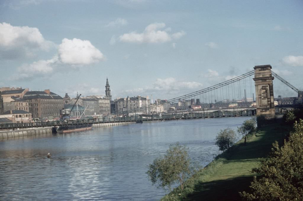 View from the south bank Laurieston and Gorbals area of the South Portland Street Suspension Bridge spanning the River Clyde in Glasgow, 1965.