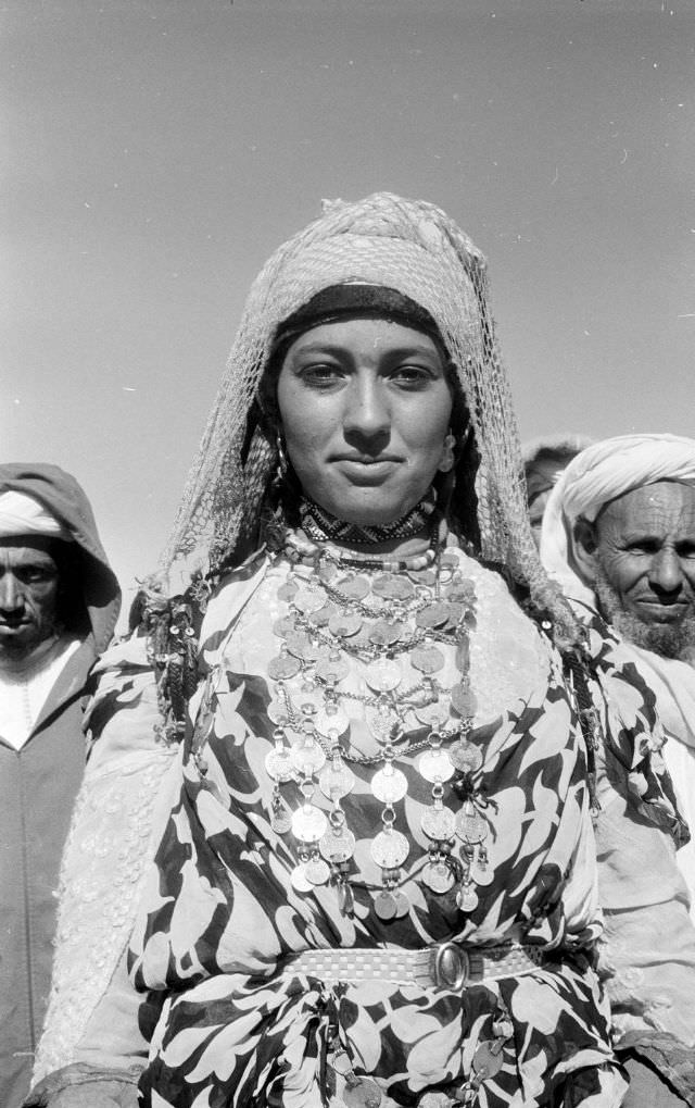 Portrait of Berber woman in headscarf and Moroccan coin jewelry, 1960s