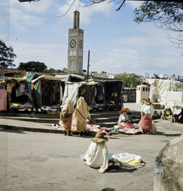 Merchants selling goods at Tangier market, 1960s