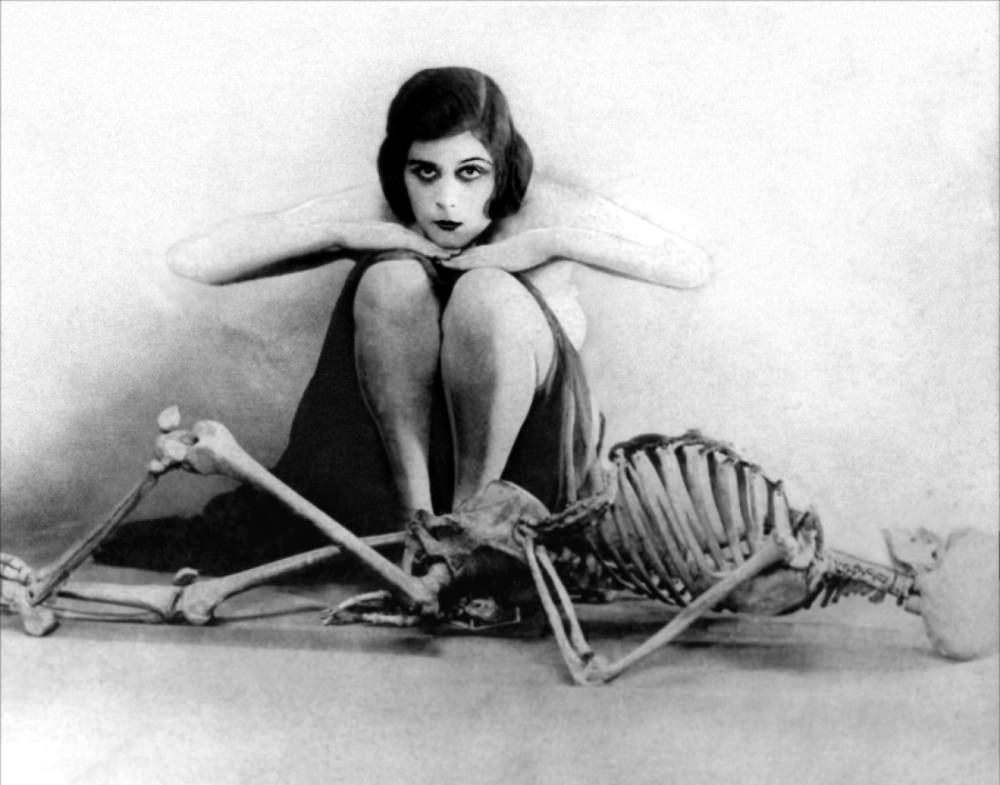 Theda Bara Posing with Skeleton for the Silent Film 'A Fool There Was (1915)