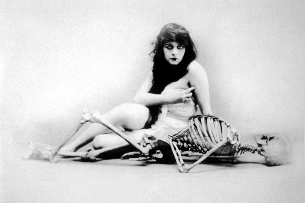 Theda Bara Posing with Skeleton for the Silent Film 'A Fool There Was (1915)