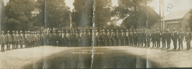 Members of the Benevolent and Protective Order of Elks shown near houses in Bakersfield, 1909