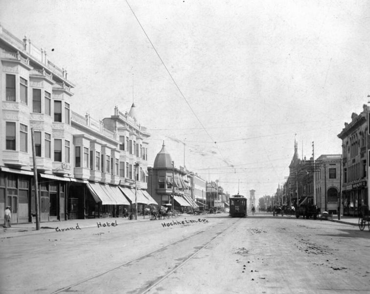 View of Chester Avenue looking south in Bakersfield, showing the Grand Hotel, 1900