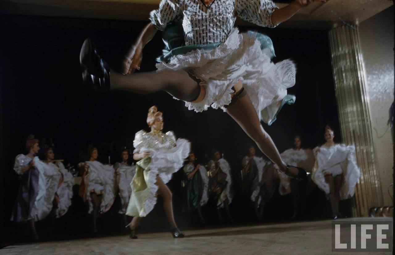 Performance and Backstage Life of Can Can Dancers at the Moulin Rouge in the 1950s