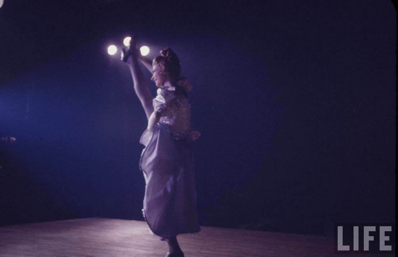 Performance and Backstage Life of Can Can Dancers at the Moulin Rouge in the 1950s