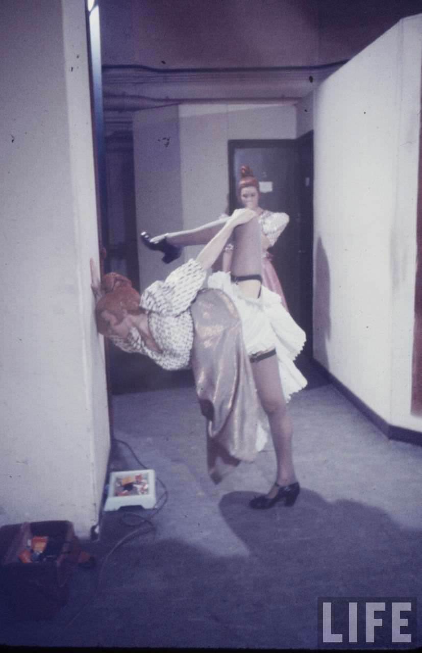 Performance and Backstage Life of Can Can Dancers at the Moulin Rouge in the 1950s