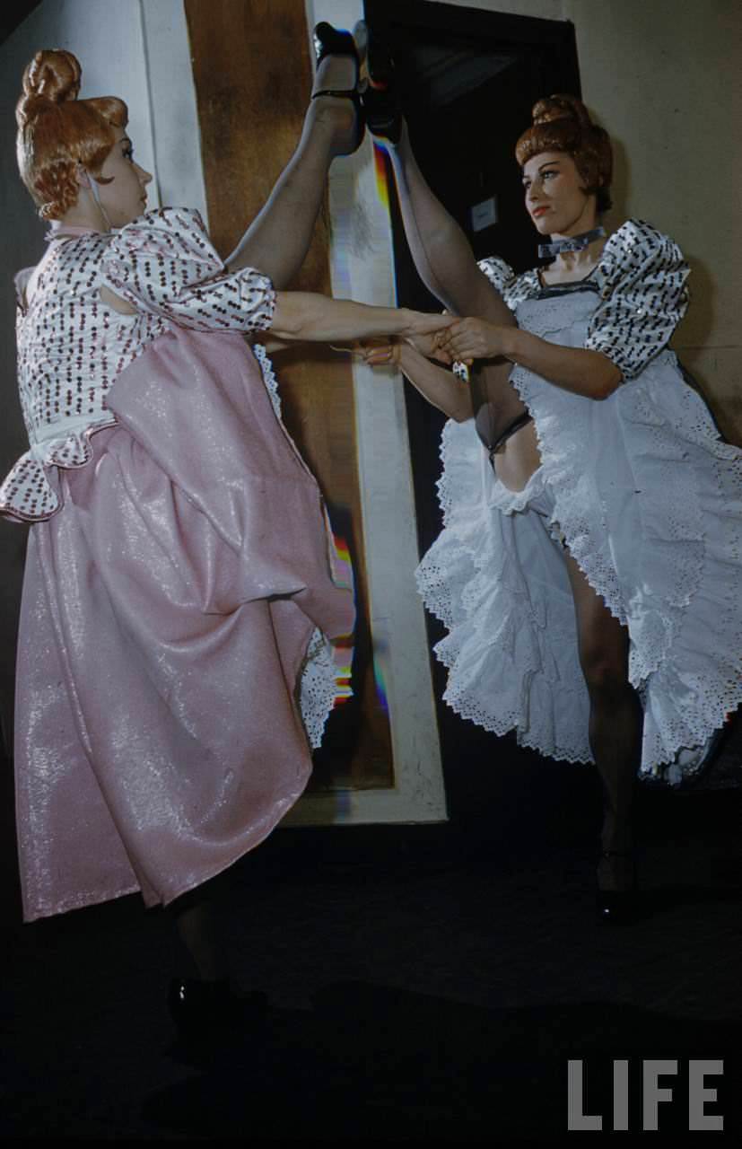 Performance and Backstage Life of Can Can Dancers at the Moulin Rouge in the 1950s