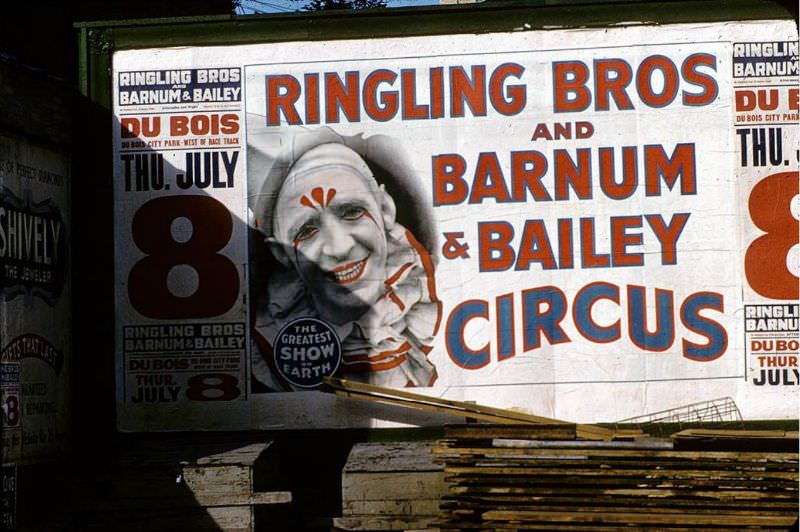 24-sheet billboard with a picture of Pat Valdo as a white-face clown.