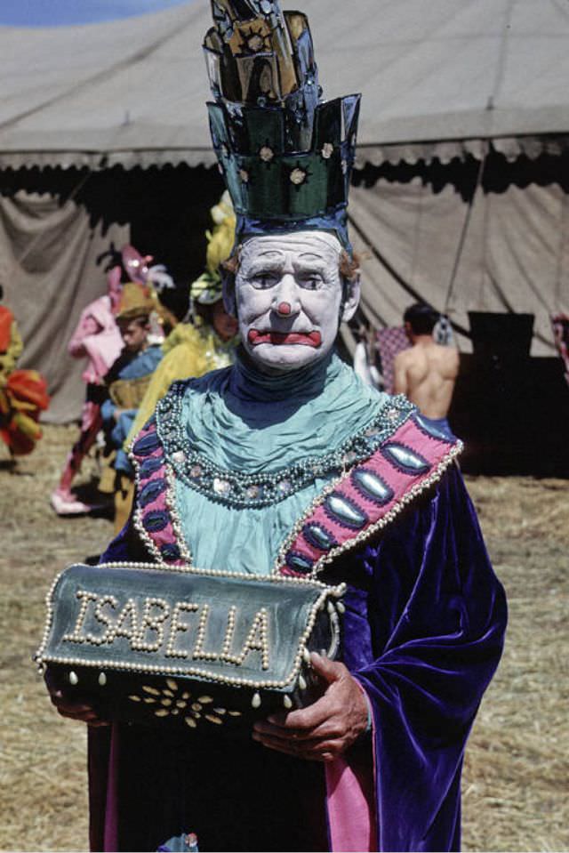 Arthur Burson, a clown in blue The Good Old Times spec wardrobe.