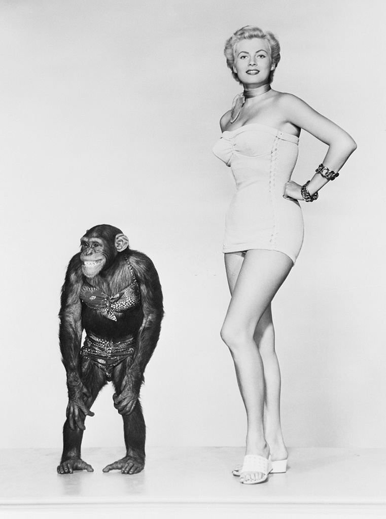 Anita Ekberg with chimp.