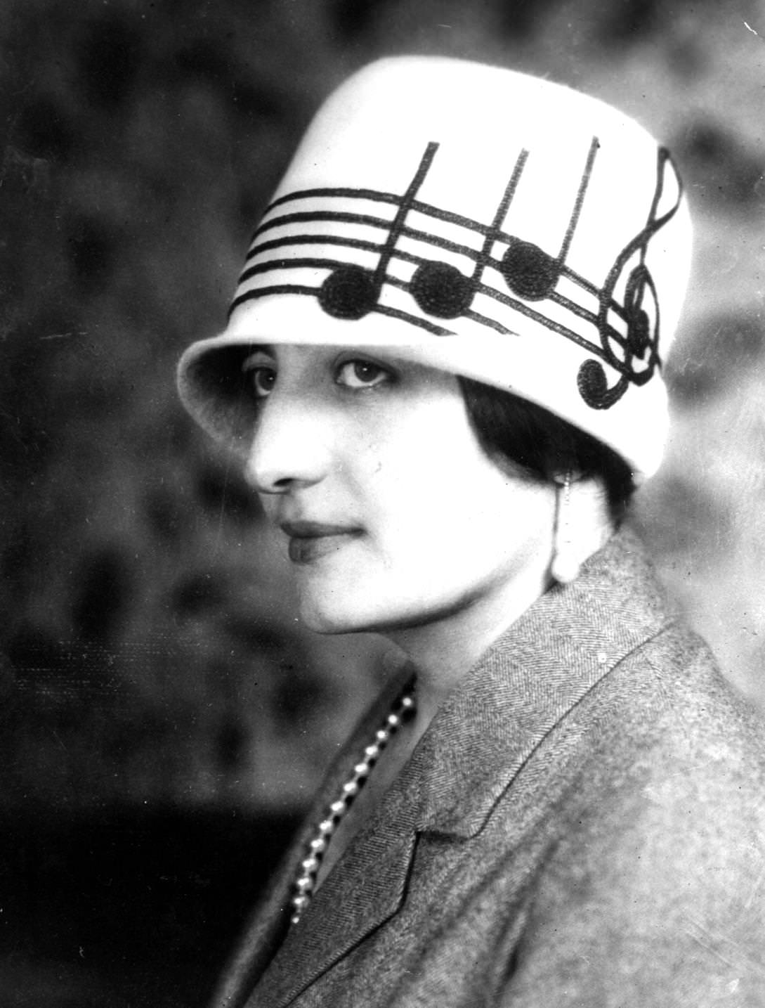 A novelty hat with musical notes embroidered on, created for a famous operatic star, 1925
