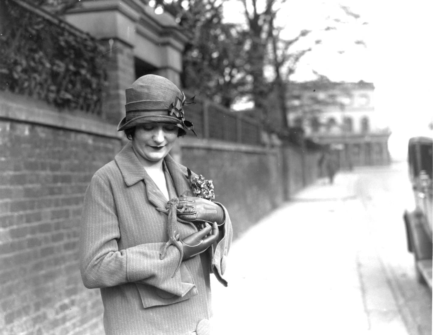 woman with the latest fashion accessory, a chameleon, 1926