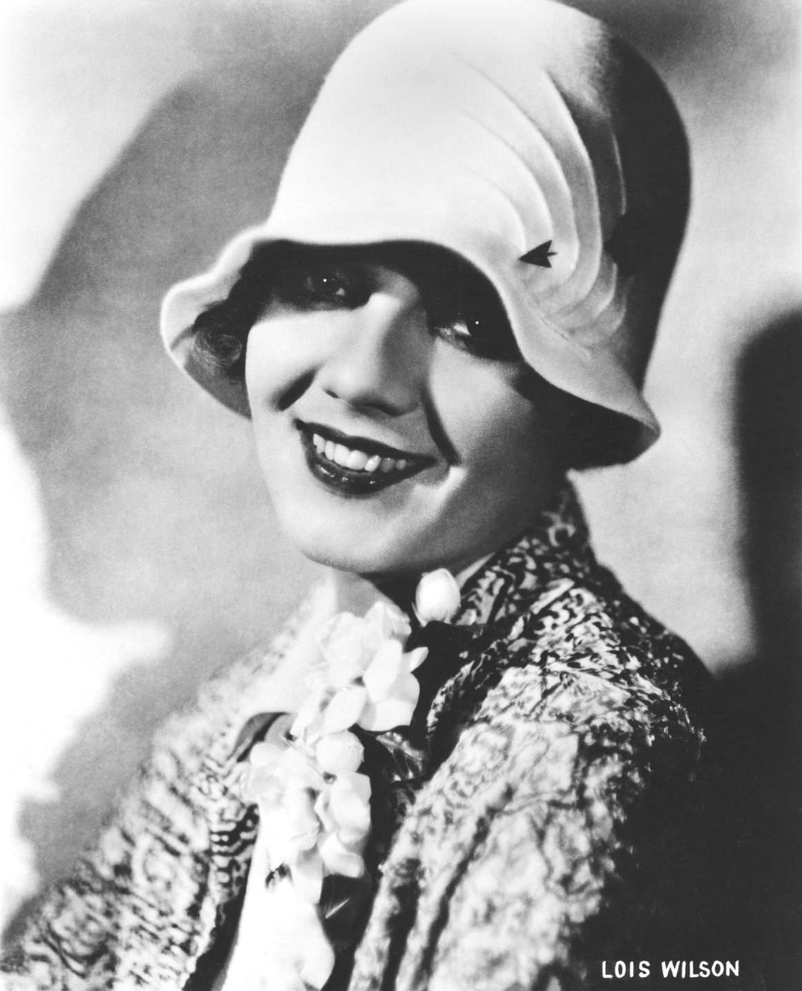 Actress Lois Wilson, Head and Shoulders Publicity Portrait wearing Cloche Hat, 1920's.