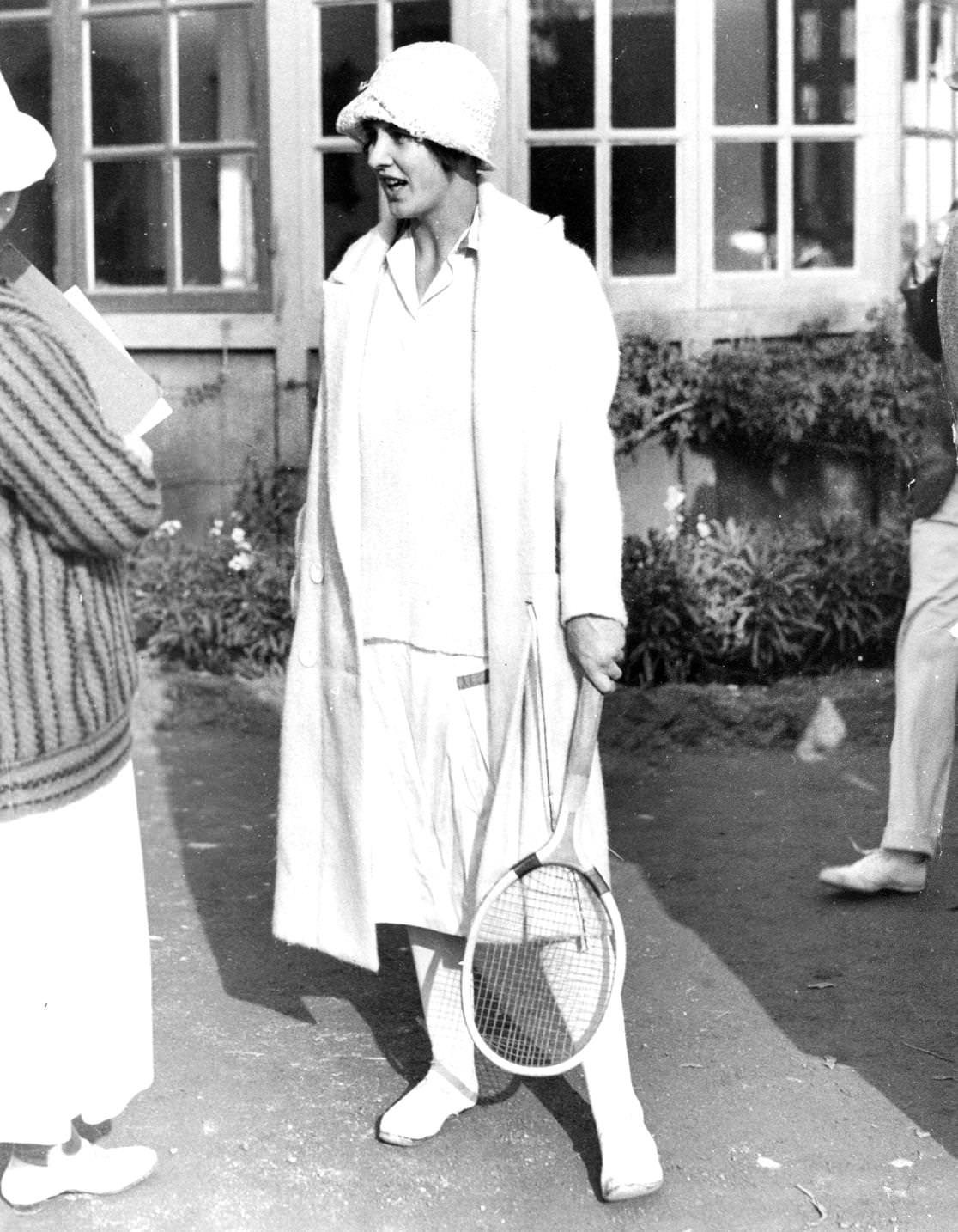 Miss Zeala Inder in cloche hat on the Cannes tennis courts, France, 1920