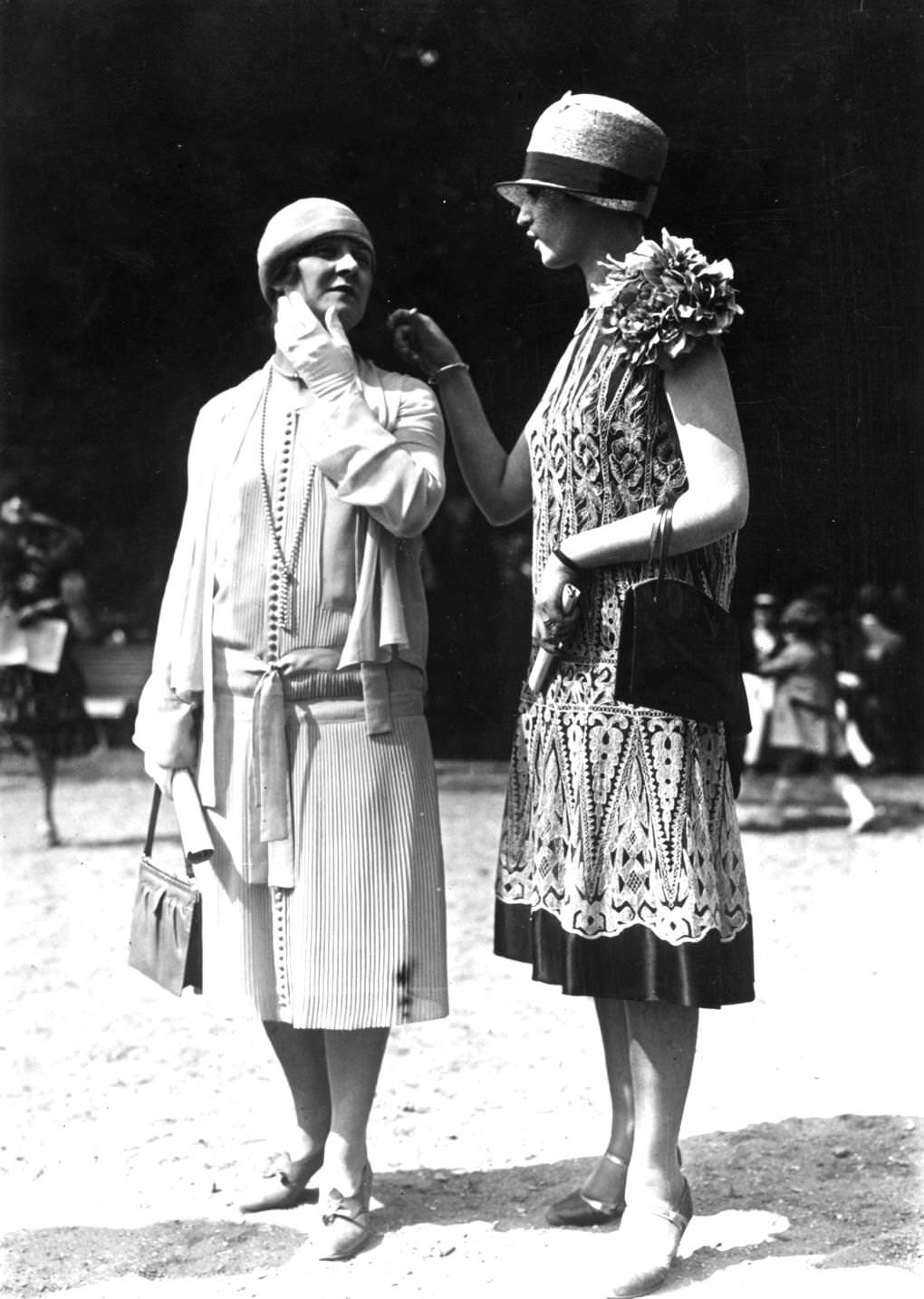 Two models wearing dresses produced by Jacquet and cloche hat, 1924