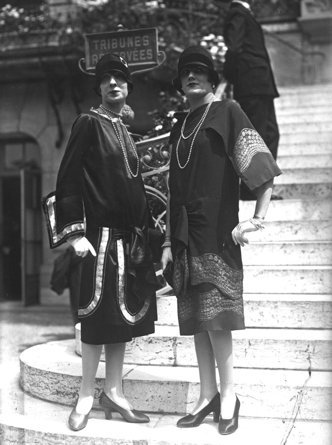 Two dresses, decorated with panels of detailed embroidery, 1924
