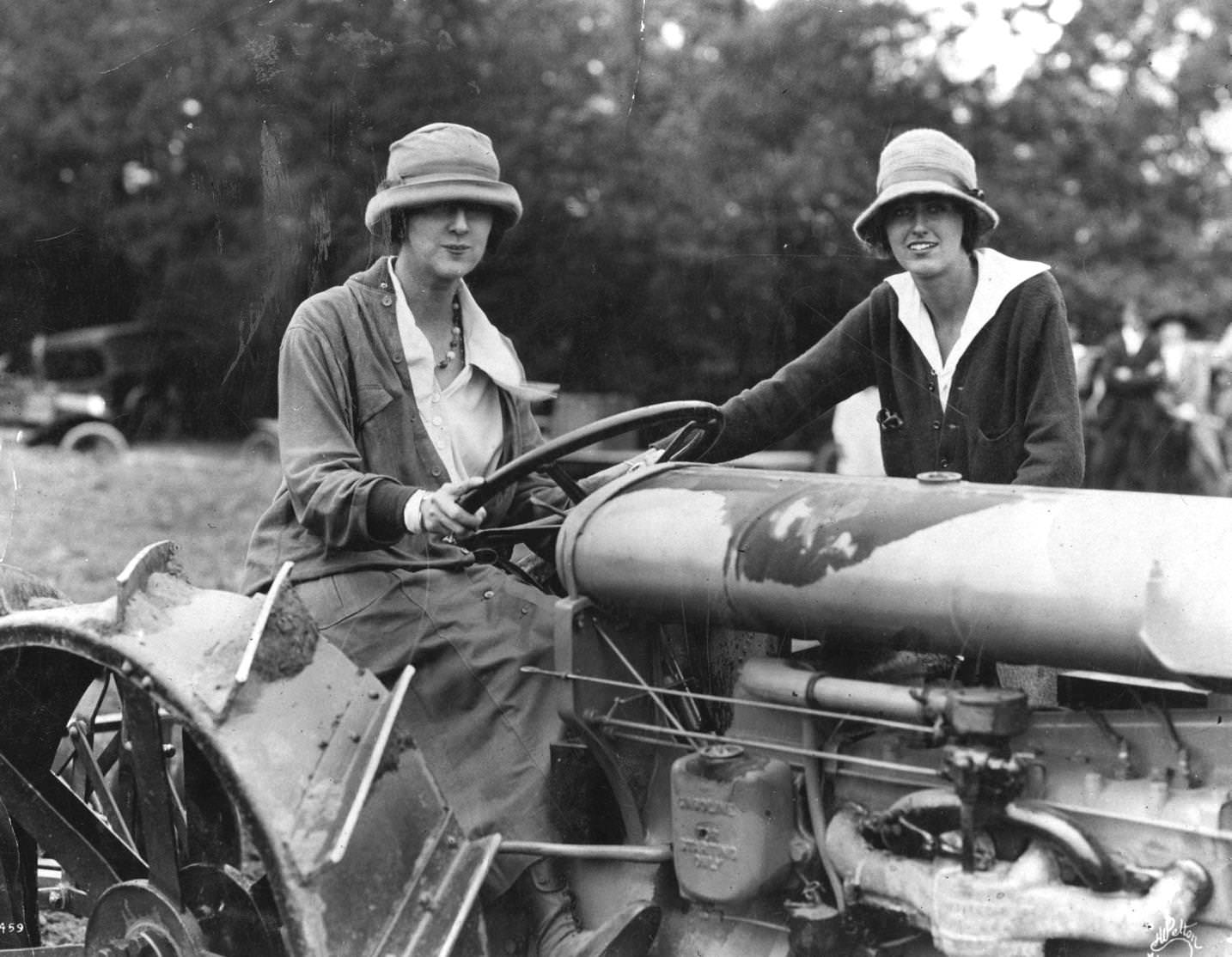 Mrs G W Vanderbilt and her daughter Cornelia, driving a Fordson tractor, 1920s