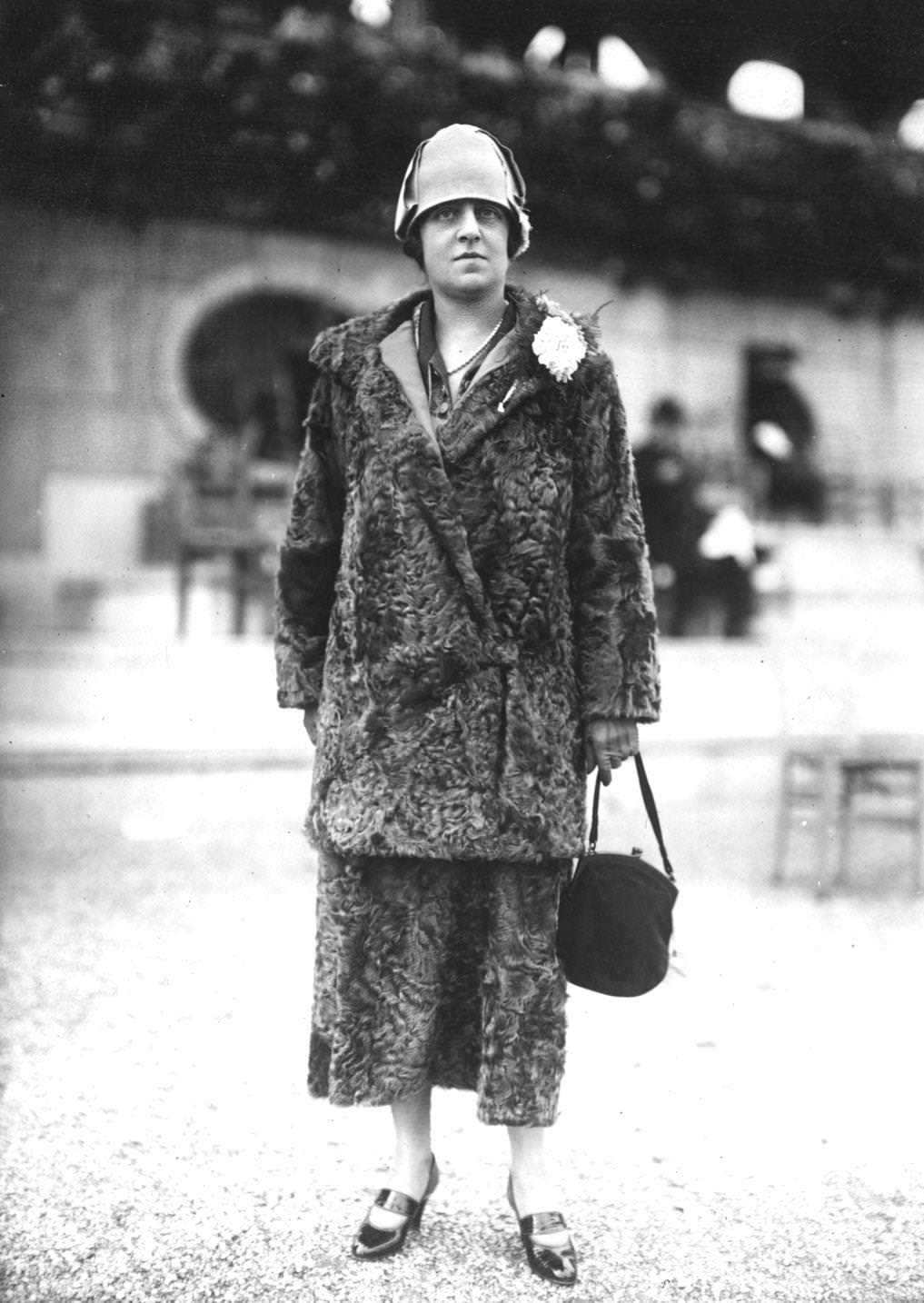 A matching Astrakhan fur jacket and calf length skirt by designer Louise Boulanger, 1923