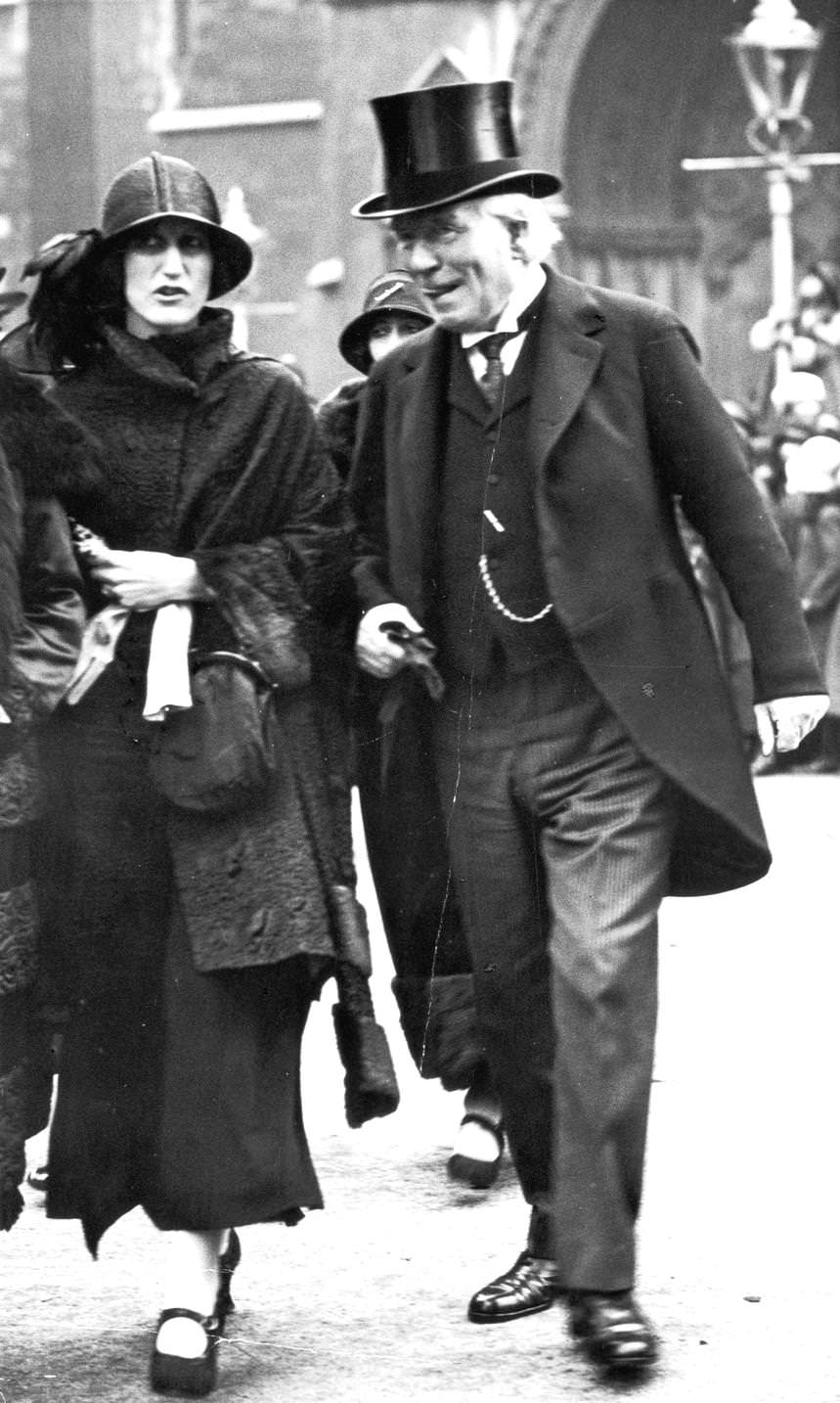Former Liberal prime minister Herbert Henry Asquith and his daughter Lady Violet Bonham-Carter attend the Mulholland-Harcourt wedding, October 1923.