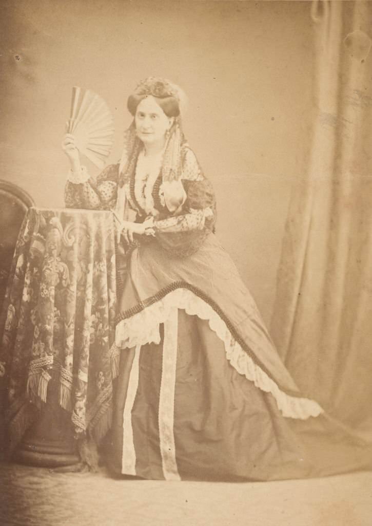 La Comtesse at Table Holding Fan, 1860s