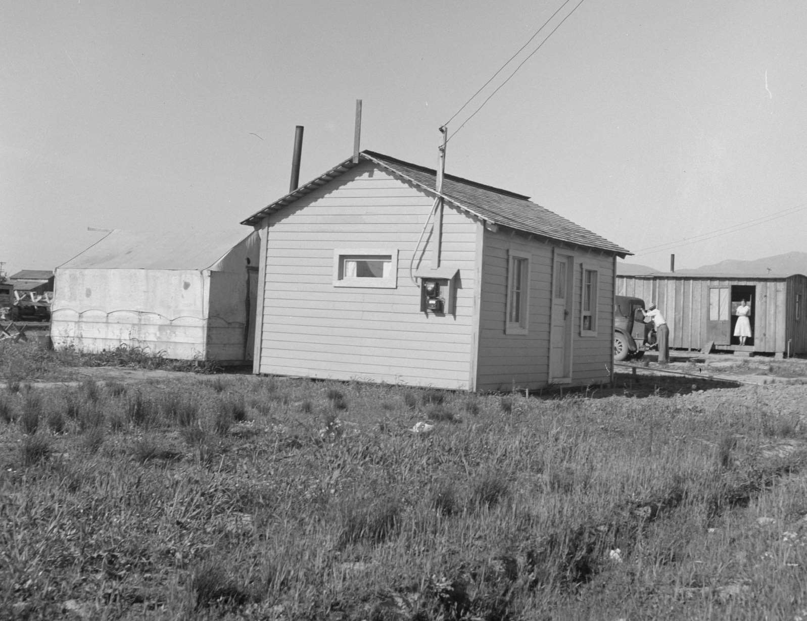 Housing for rapidly growing settlement of lettuce workers on fringes of town. Salinas, California, 1939