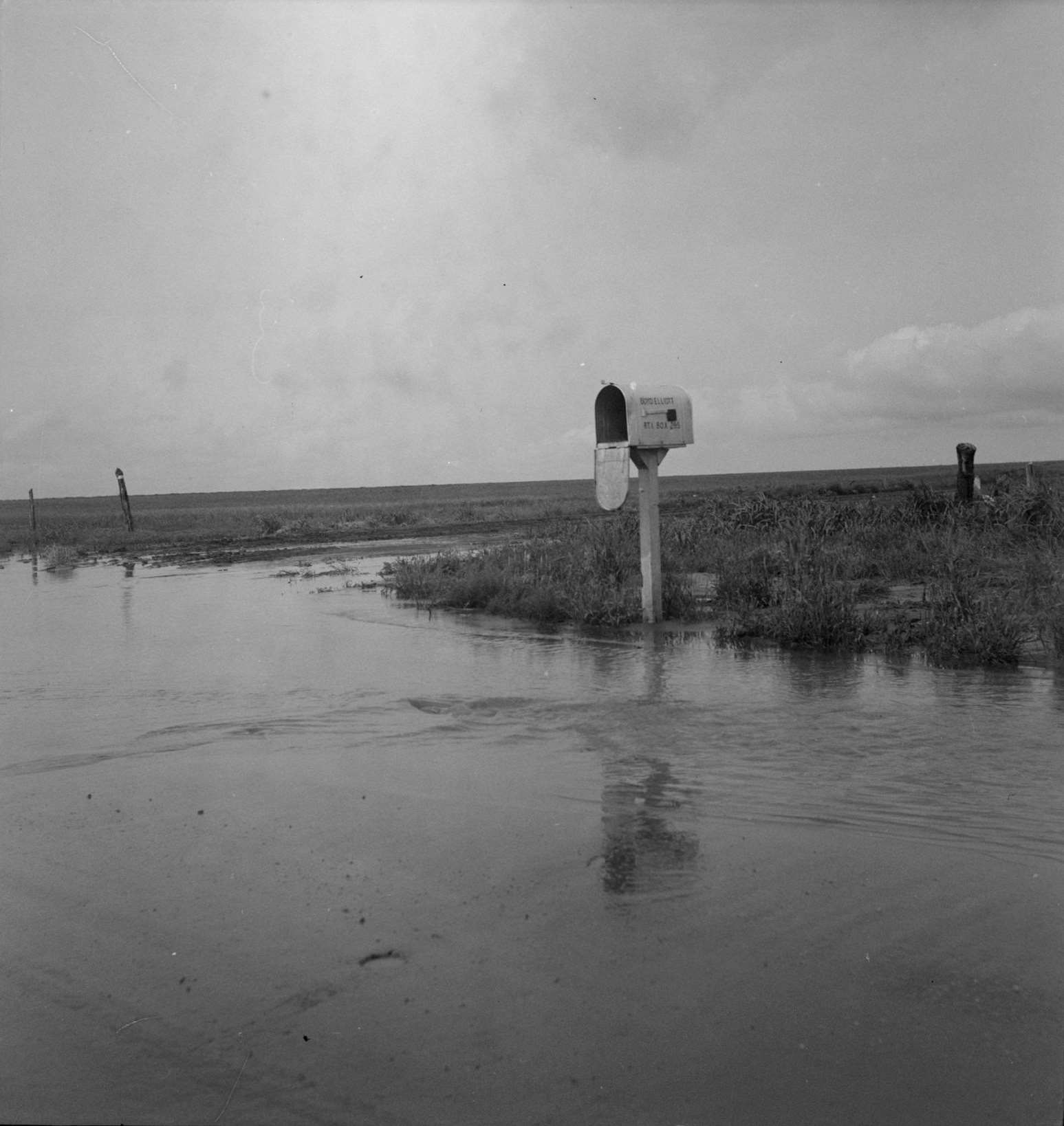 This year (1937) there are floods and heavy rains in the Dust Bowl, 1932