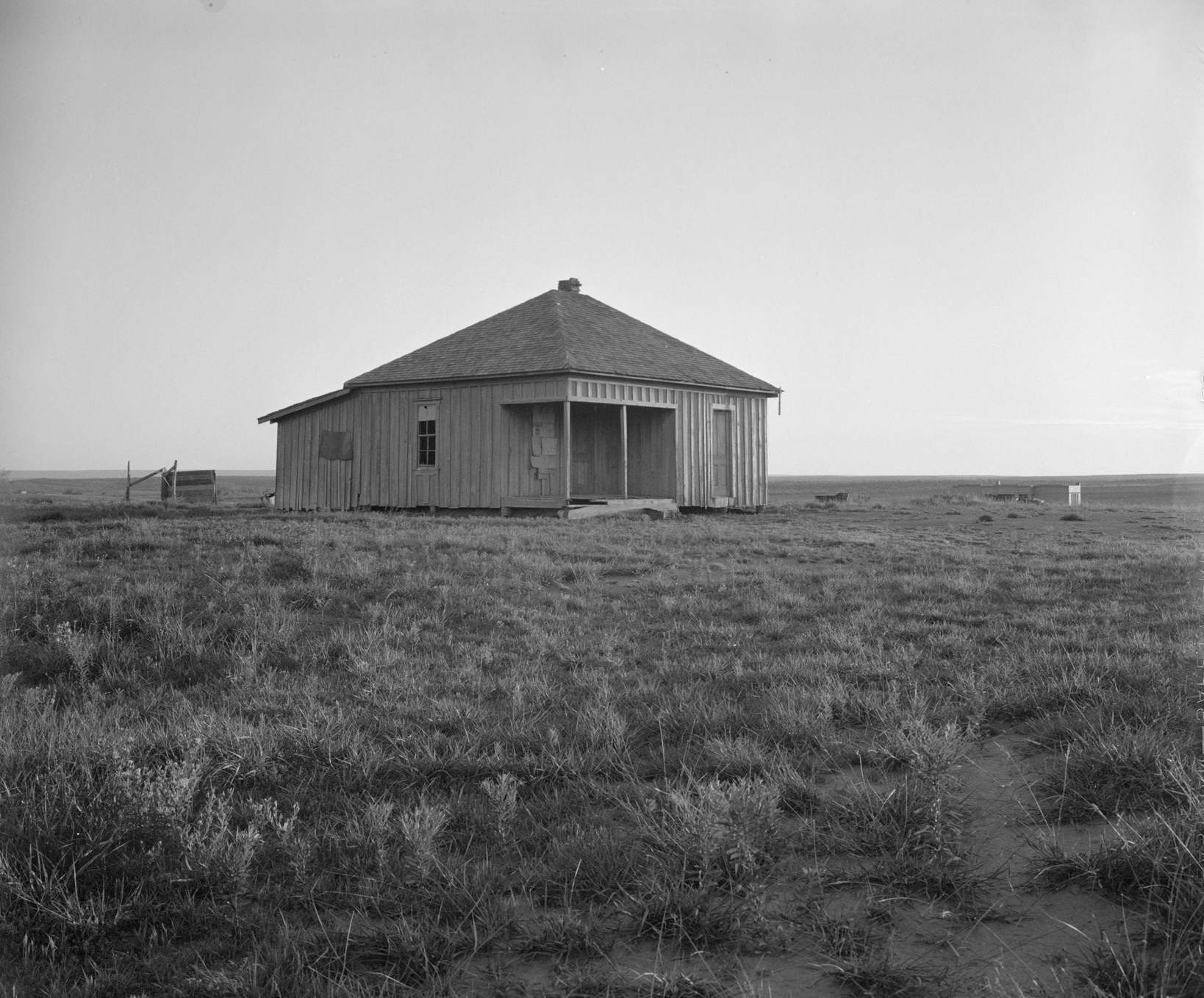 Abandoned house and land, Hall County, Texas. There were formerly twelve families employed on this land, now there are none, 1930s