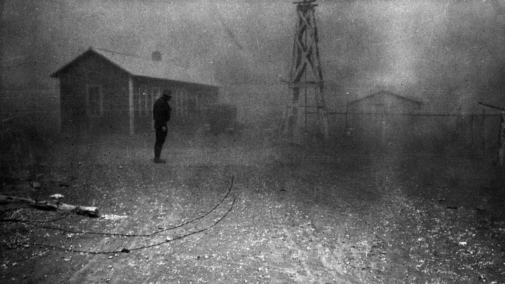 A dust storm. Conditions like these forced many farmers to abandon the area. New Mexico, 1930s