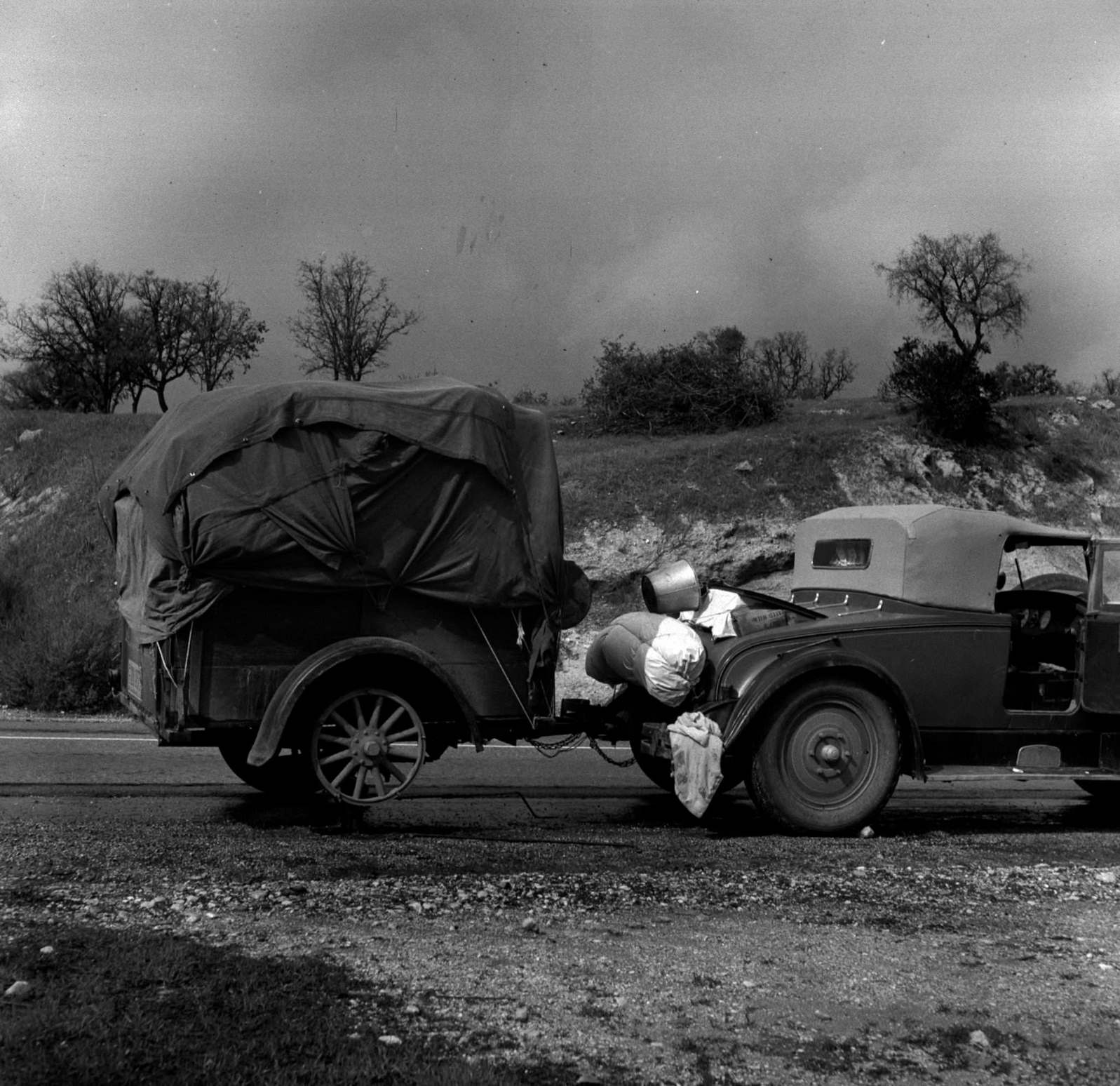 An oil worker builds himself a trailer and takes to the road, California, 1930s