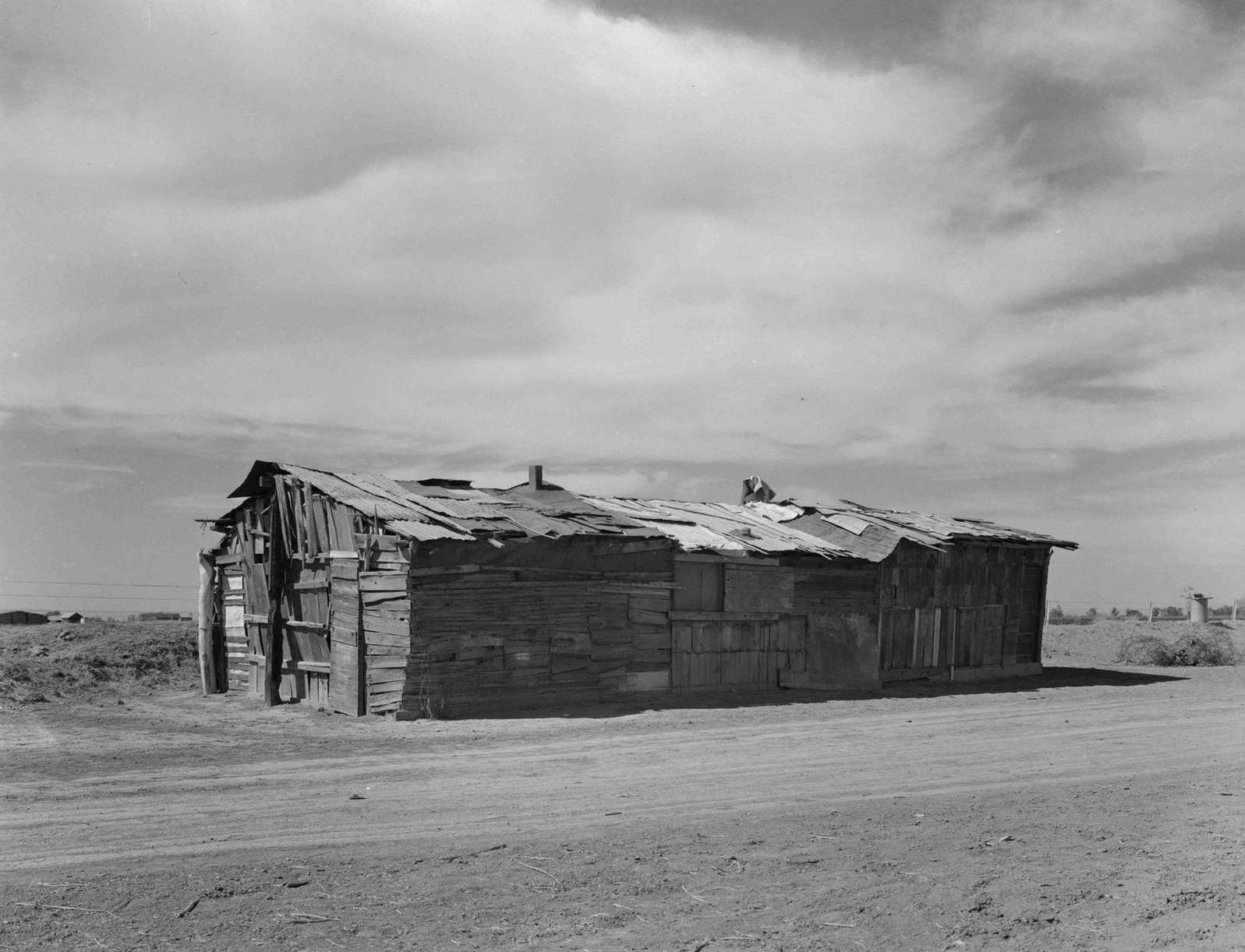 Housing typical of that afforded Mexican field workers of the Imperial Valley. These people are not migrants, 1930s