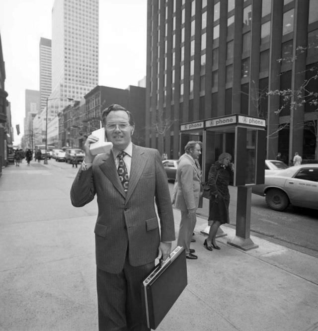 John Mitchell with his phone on the streets of New York. He helped develop the design for the first mobile phone, 1973.