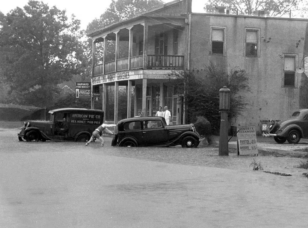 Waters from the 1935 event even reached into the Heights, flooding Harvard Street and turning the Harvard Food Market at the corner of 9th into a temporary island.