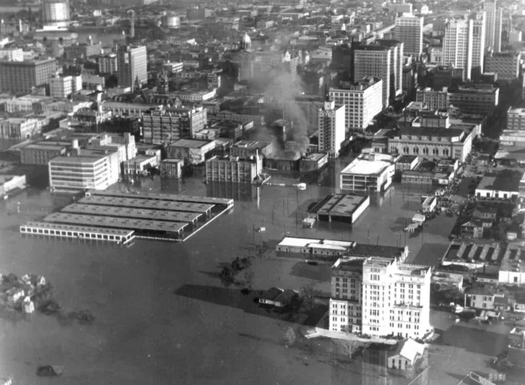 The Houston Fire Department lost eight trucks in the 1935 flood, many of which were attempting to put out the blaze at the Yellow Cab Company on Louisiana Street.