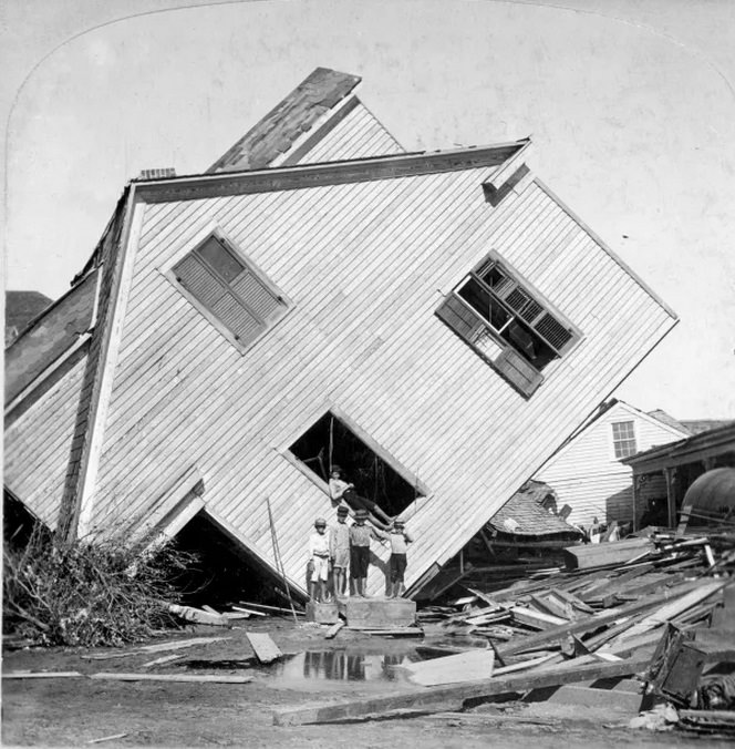 A house on Avenue N lies on its side following the Hurricane in Galveston.