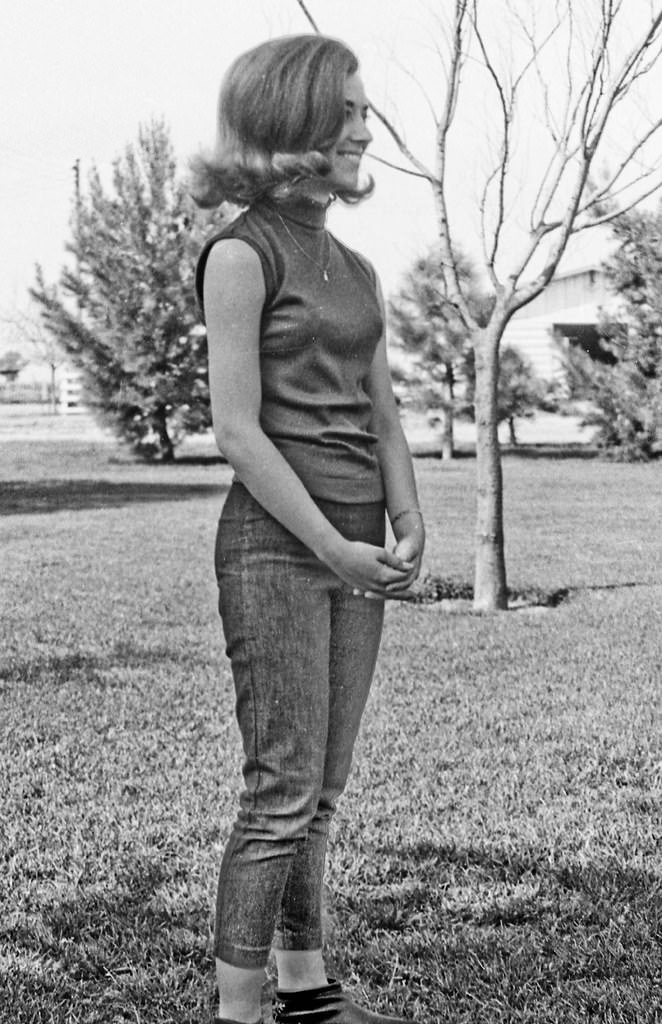 Kathy watching the baseball game, 1966