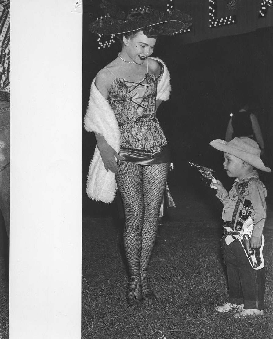 Performer with small boy, 1950s