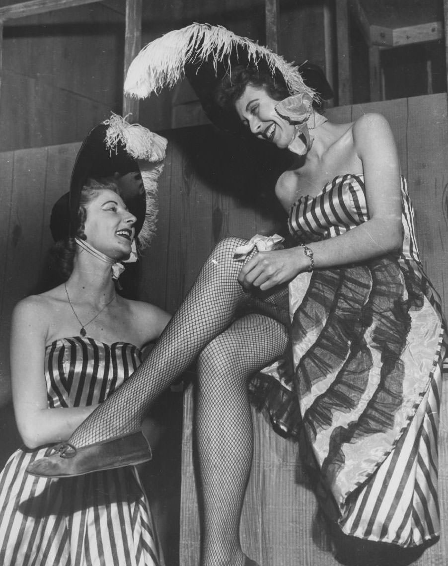 Candid shot of performers in costume, 1950s