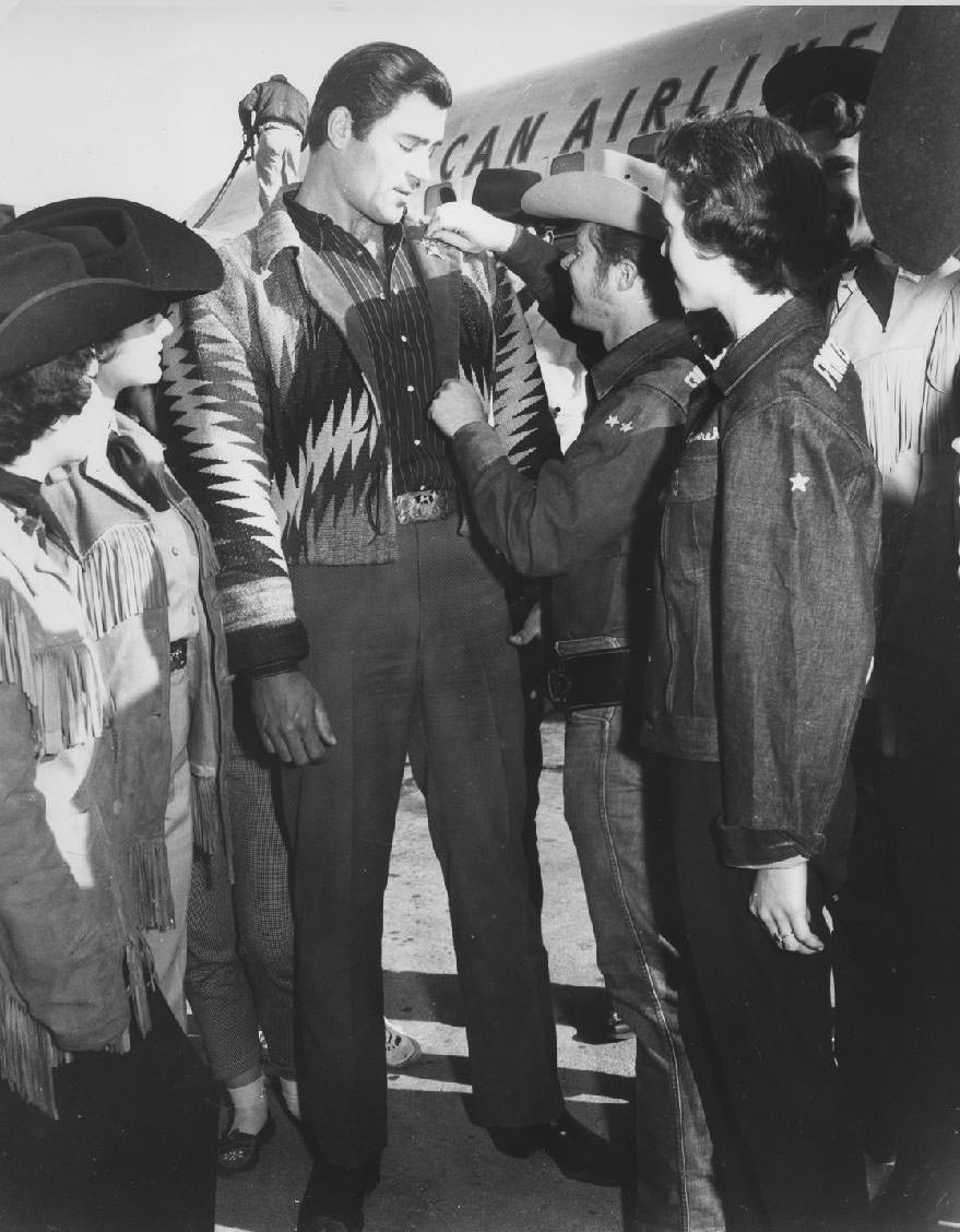 Student pins a sheriff's badge on another student, 1950s