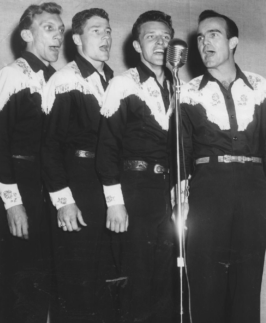 Singing quartet at microphone, 1950s
