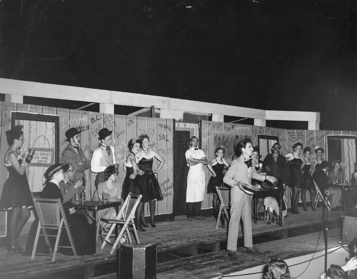 Students perform on stage, 1950s