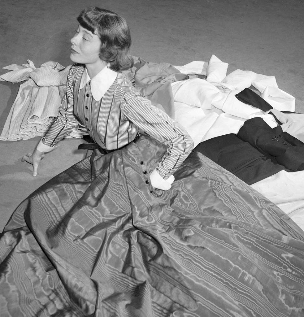 Model Bettina Graziani shows one of the eleven Jacques Fath dresses chosen as a trousseau by screen star Rita Hayworth.
