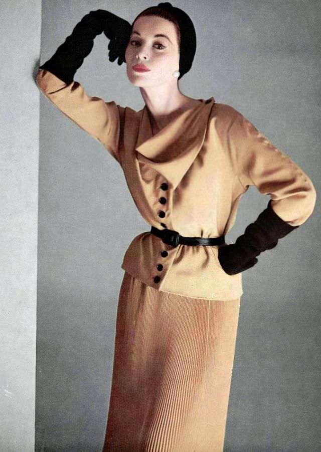 Joan Whelan in two-piece silk crepe dress with finely pleated skirt by Jacques Fath,photo by Pottier, 1952
