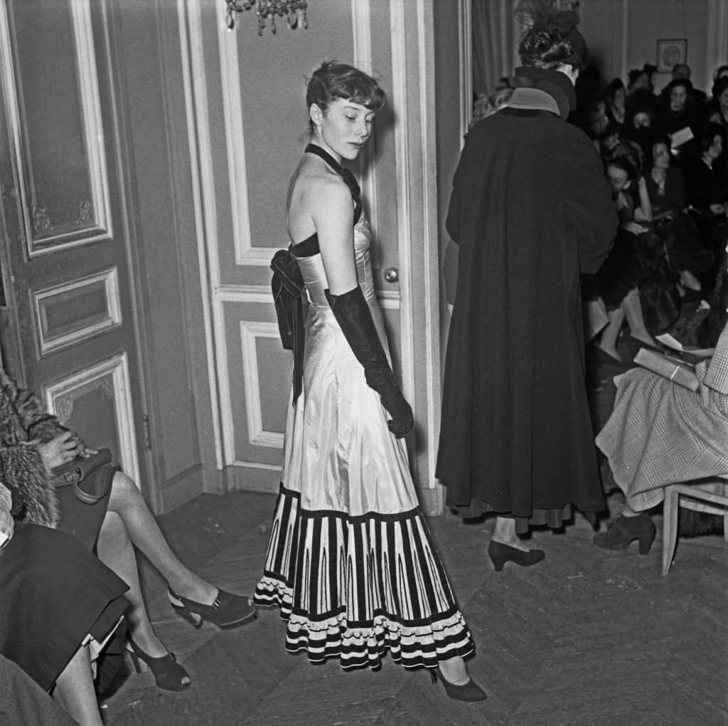 A model wearing a Jacques Fath design at the designer's Summer 1948 fashion show in Paris, France, February 1948.