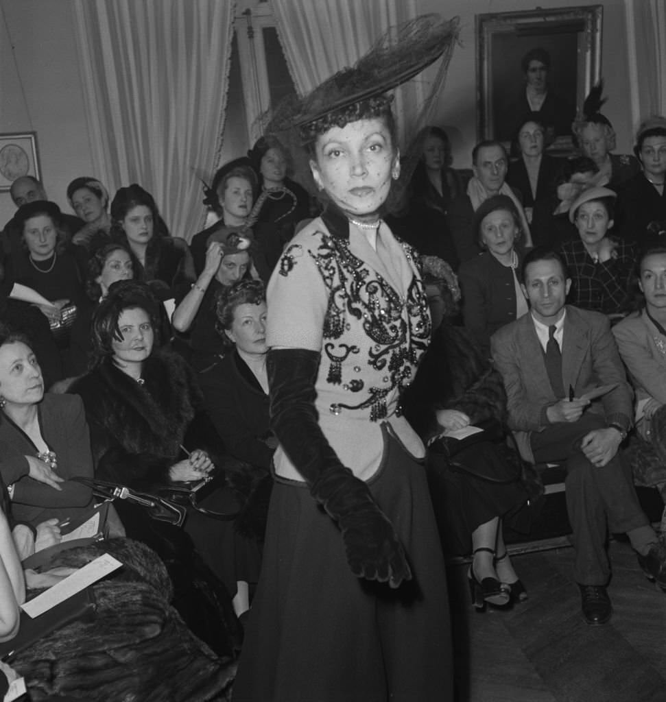 A fashion show for the Jacques Fath spring collection in Paris, France, February 1948.