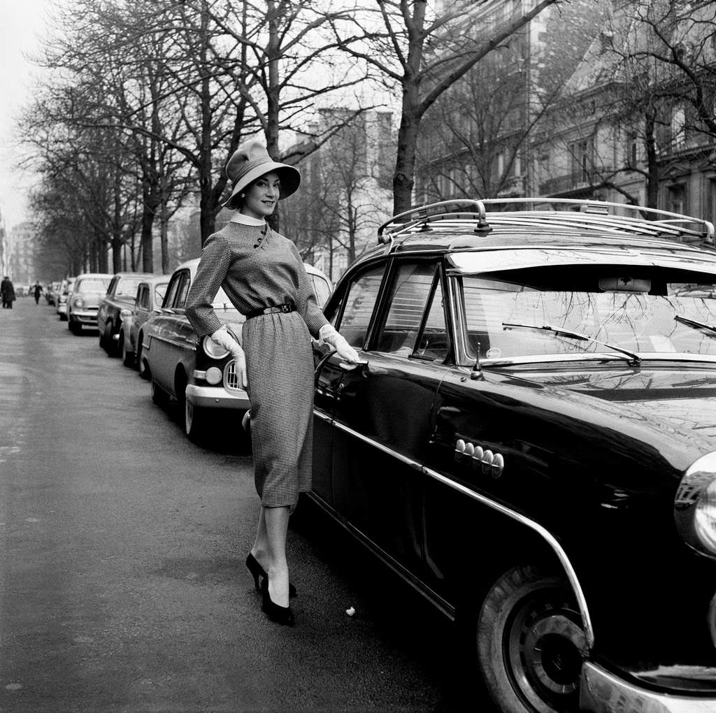 Model wearing a Jacques Fath model in 1957.