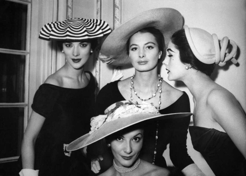 Models wear hats designed by Rose Valois, Gilbert Orcel and Jacques Fath on January 27, 1955 in Paris, France.