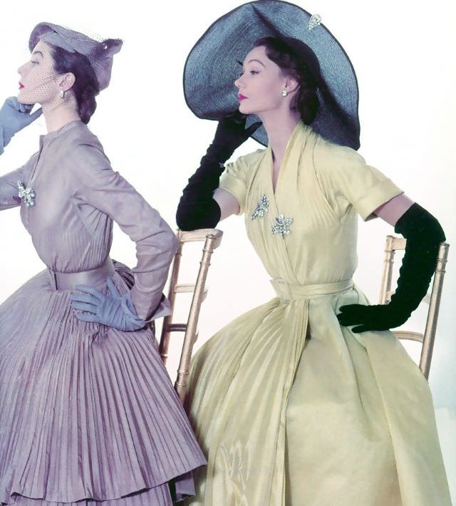 Bettina and Sophie in silk taffeta dresses by Jacques Fath, photo by John Rawlings, originally published in American Vogue, 1951