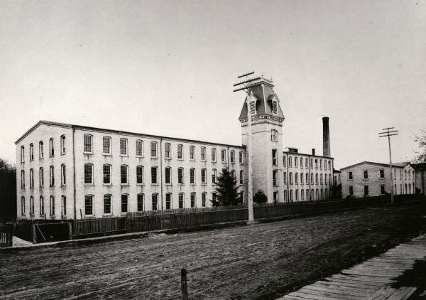 The No. 1 Cotton Mill. Plank sidewalk in foreground, 1893