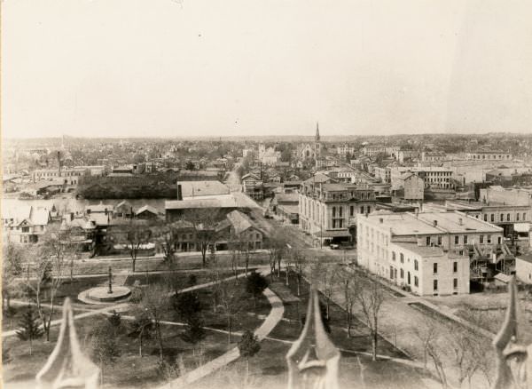 Elevated view looking down Court Street in Janesville toward the west, 1870