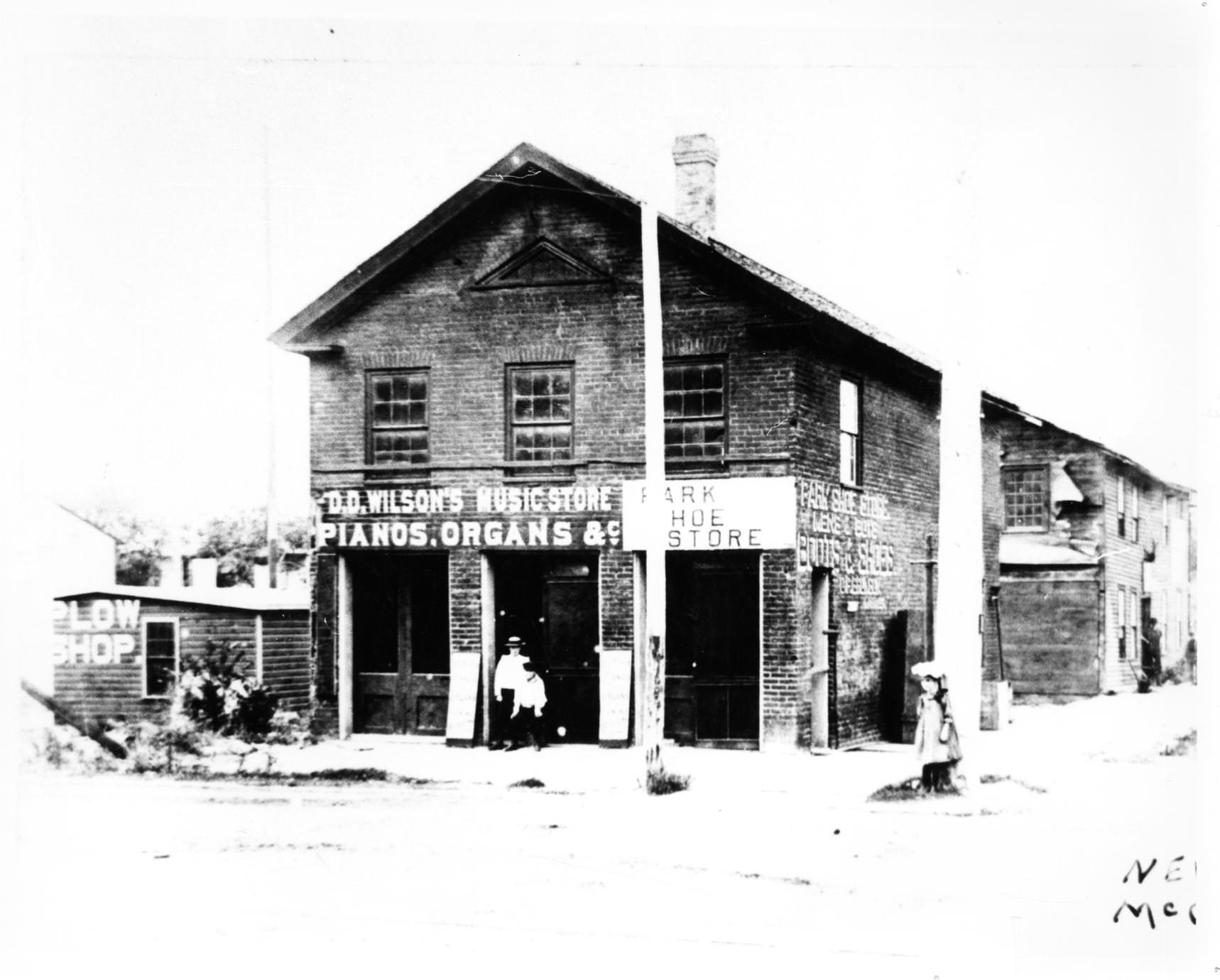 D. D. Wilson's Music Store and the Park Shoe Store, at the northwest corner of Court and Main Streets, 1870